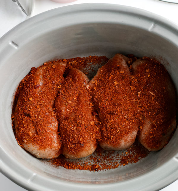 slow cooker with chicken and taco seasoning