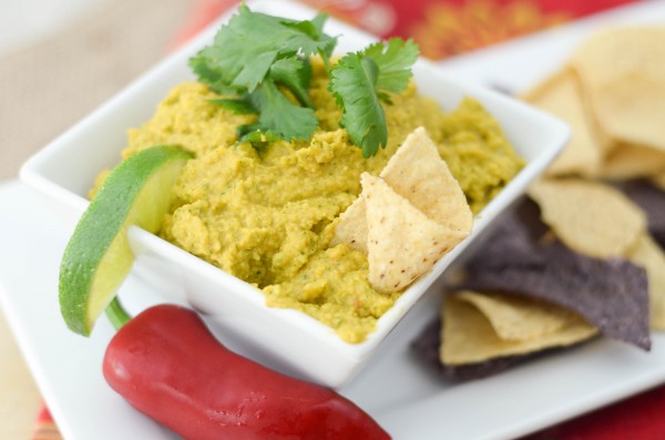 spicy guacamole dip plated to serve with a chip