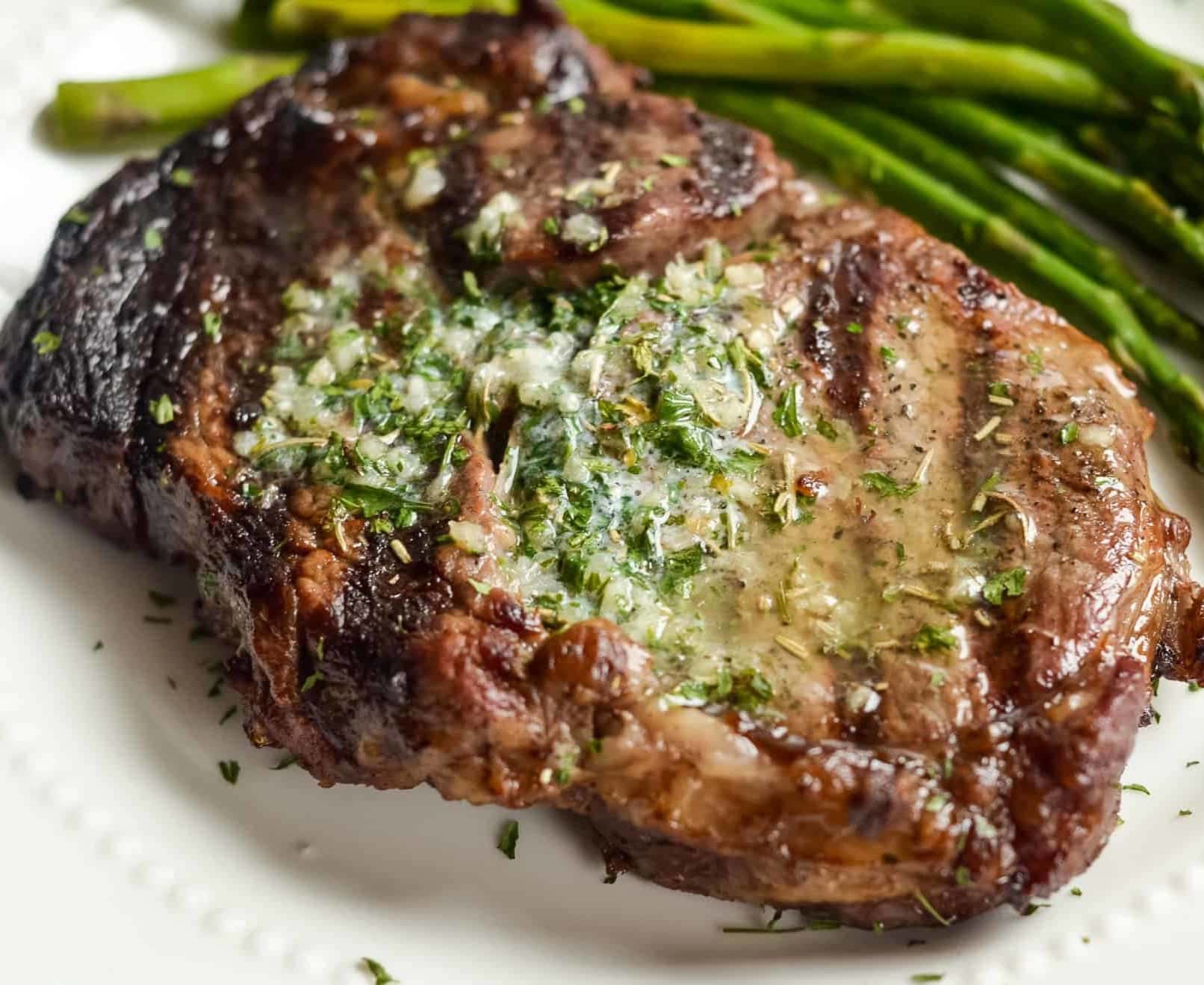 How to Make Garlic Butter Ribeyes on the Grill