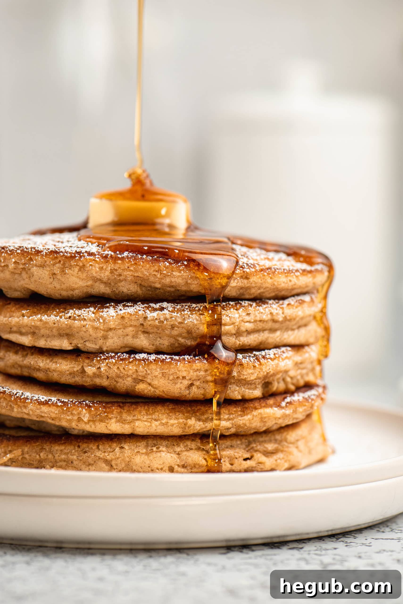 Warm Spiced Ginger Flapjacks 8 Delicious Ginger Pancakes with syrup and powdered sugar