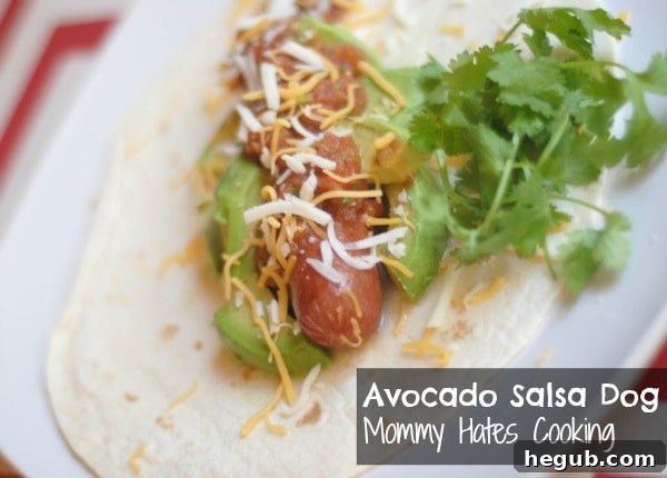 Avocado & Salsa Hot Dog with a generous layer of melted Mexican-style cheese