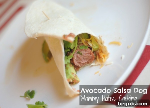 Rolled Avocado & Salsa Hot Dog, ready to be enjoyed, showing its delicious fillings