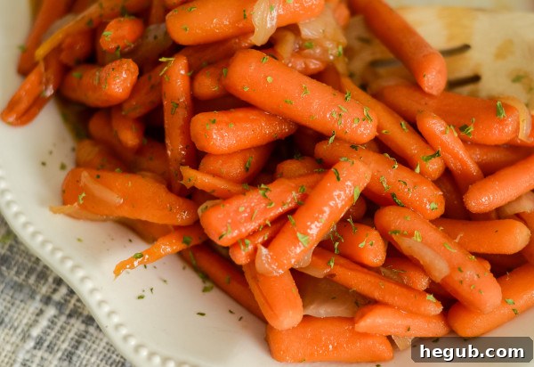 Various types of carrots suitable for cooking, including baby carrots and whole carrots