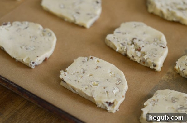 Gluten-Free Pecan Sandie dough rolled and ready for slicing
