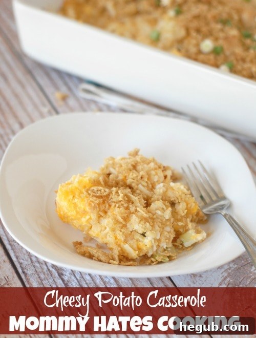 Completed Cheesy Potato Casserole ready to serve, with a golden-brown topping.