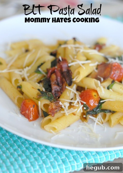 Delicious BLT Pasta Salad with crispy bacon, fresh tomatoes, and vibrant spinach