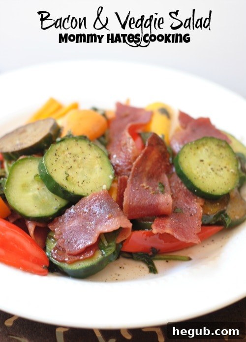 Freshly prepared Bacon and Veggie Salad with crispy turkey bacon and vibrant vegetables