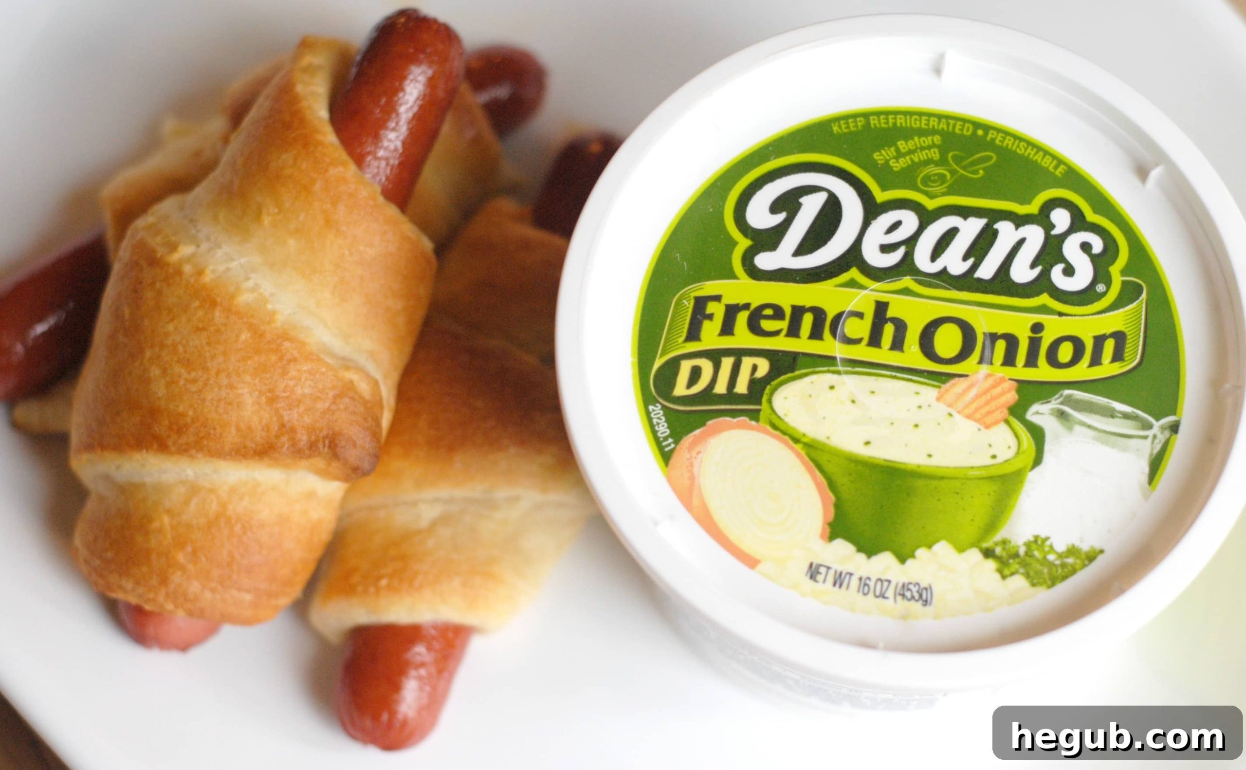 Various containers of Dean's Dip flavors displayed on a table