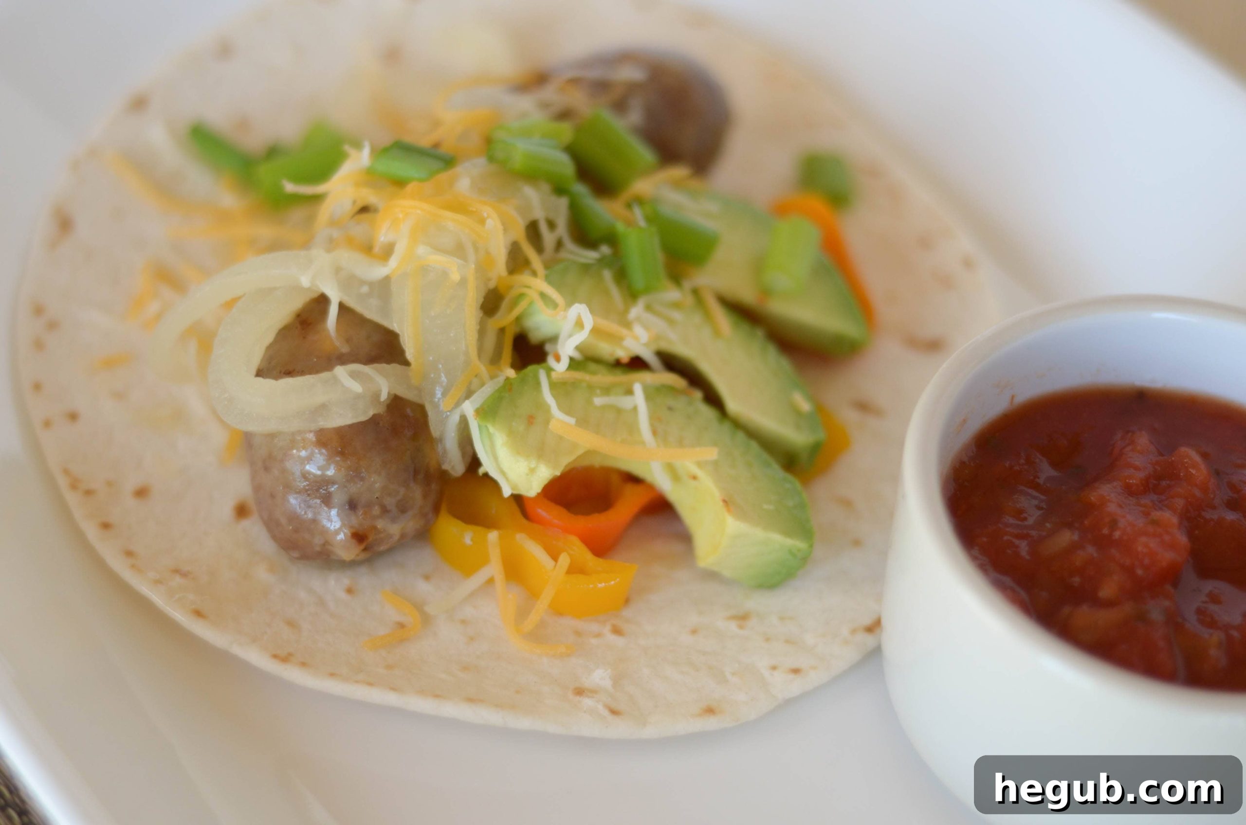 Slow Cooker Brats with melted cheddar
