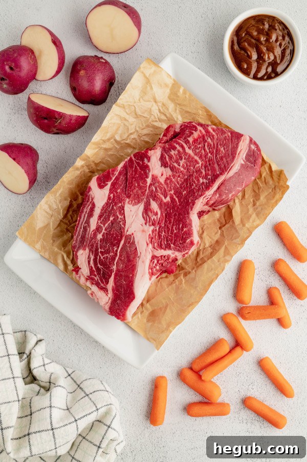 Tender 4-Ingredient Slow Cooker Roast Beef 3 Close-up of raw beef chuck roast, ideal for slow cooking