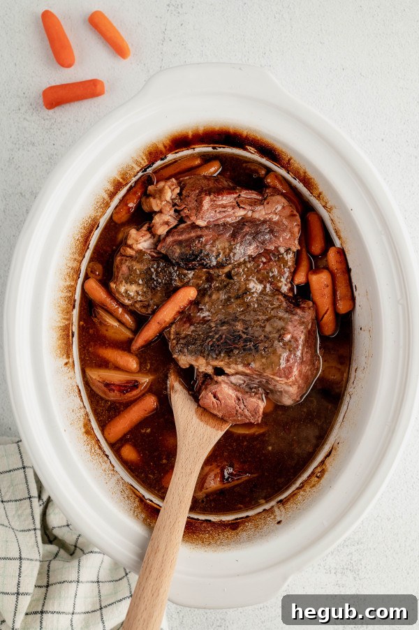 Tender 4-Ingredient Slow Cooker Roast Beef 5 4-ingredient slow cooker roast beef cooking in a multi-cooker