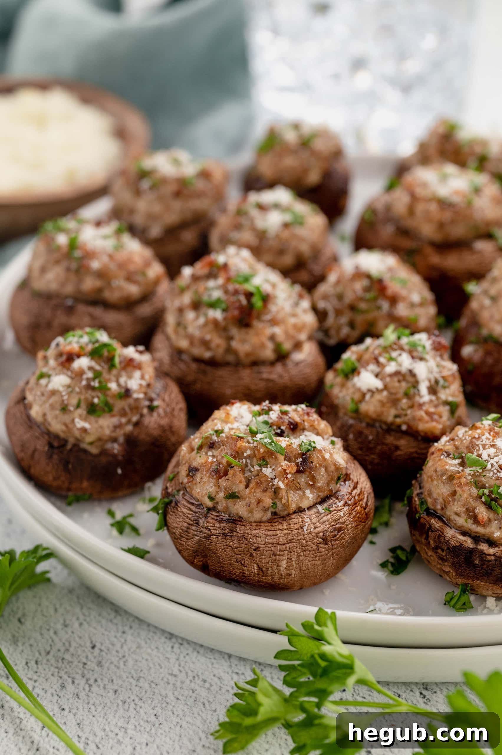 A close-up image of a cooked Stuffed Portobello Mushroom, showing its golden-brown topping and rich, savory filling, ready to be enjoyed.