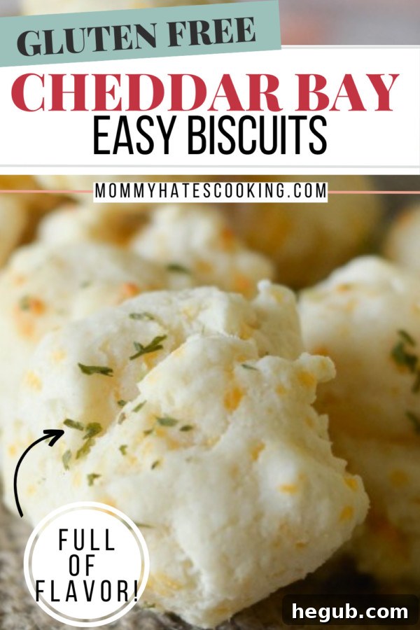 A beautifully arranged plate of freshly baked gluten-free cheddar bay biscuits, golden and inviting