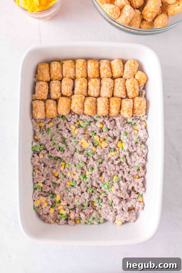 Tater Tot Casserole baking to golden perfection in the oven