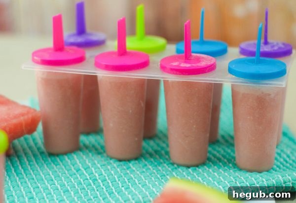 Watermelon Yogurt Pops in molds before freezing