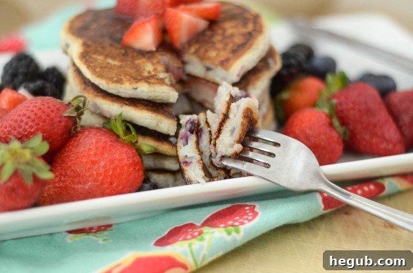 Gluten-Free Pancakes with various fresh berries and syrup