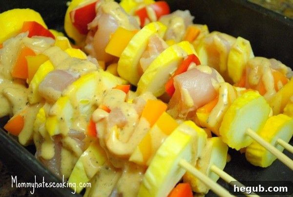 Freshly grilled chipotle chicken and vegetable kabobs ready to serve