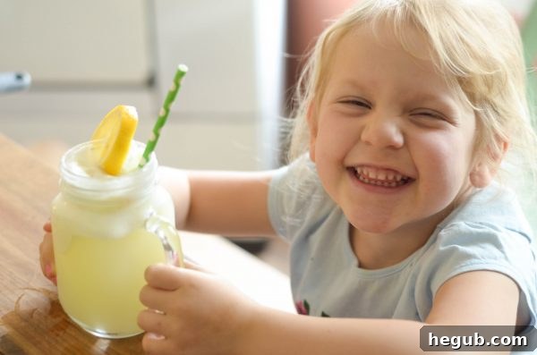 Golden Citrus Cooler 6 Glasses of Lemonade Punch with fresh fruit