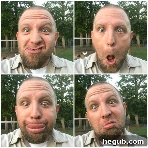 Husband making a silly face for a selfie in the garden, with plants blurred in the background, embodying spontaneous fun.