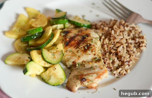 Perfectly grilled Honey Mustard Chicken, showcasing a beautiful golden-brown crust and juicy interior. This image is ideal for inspiring quick, flavorful, and healthy grilled chicken recipes.