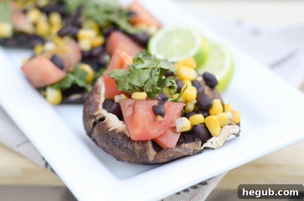 Stuffed Corn Salsa Portobello mushrooms, grilled to perfection, showcasing a delicious vegetarian option for grilling. The vibrant filling and smoky char make this an enticing dish.