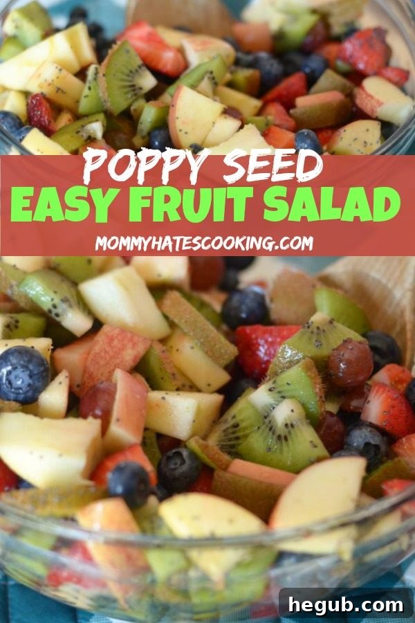 Effortless Poppy Seed Fruit Medley 6 A large, inviting bowl of Poppy Seed Fruit Salad, artfully arranged and ready for serving. The fruits are glistening, highlighting their freshness and the delicate poppy seed dressing.