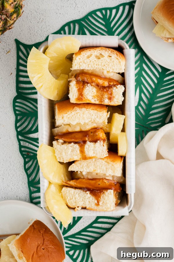 Delicious Hawaiian Chicken Sliders piled high, ready to serve for an easy lunch or dinner.
