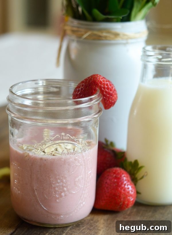 Delicious and healthy Strawberry Banana Oat Smoothie in a glass, perfect for a quick breakfast on busy school mornings.
