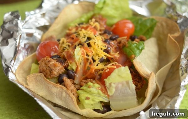 Fully loaded gluten-free taco salad ready to be enjoyed