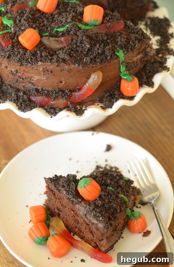 Spiced Pumpkin Patch Delight 4 Close-up of a festive Pumpkin Patch Cake with candy pumpkins and gummy worms