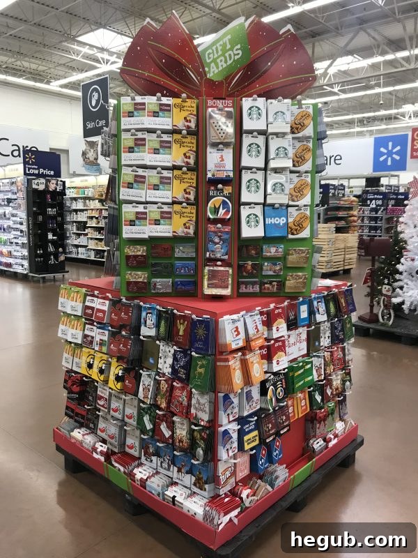 A vibrant holiday gift card display inside a Walmart store, showcasing various festive designs and brands, making holiday gift selection effortless.