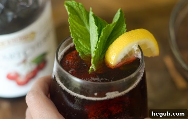 Ruby Mint Refresher 8 Refreshing Cherry Mint Spritzer on a hot day
