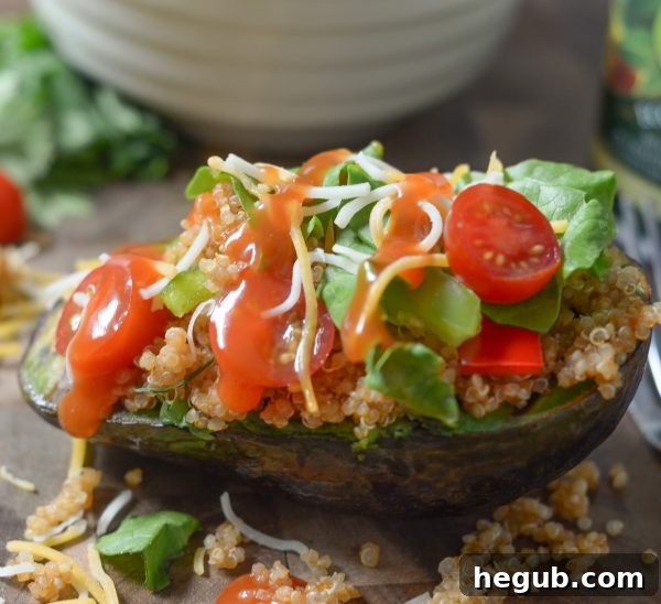Taco Style Quinoa Stuffed Avocado, a healthy and vibrant meal option for your fall menu plan.