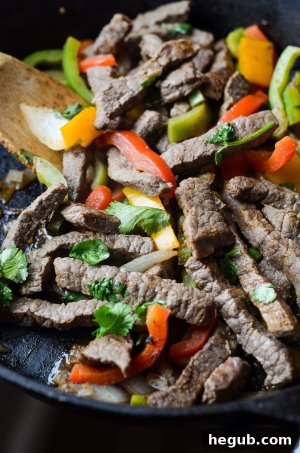 Delicious Gluten-Free Skillet Beef Fajitas with colorful peppers and onions