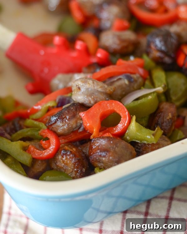 Air fryer bratwurst and vegetables on a plate, a quick and healthy meal