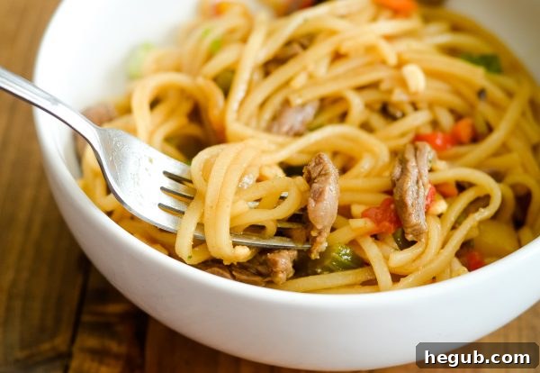 A bowl of fresh Beef Pad Thai, ready to be served.