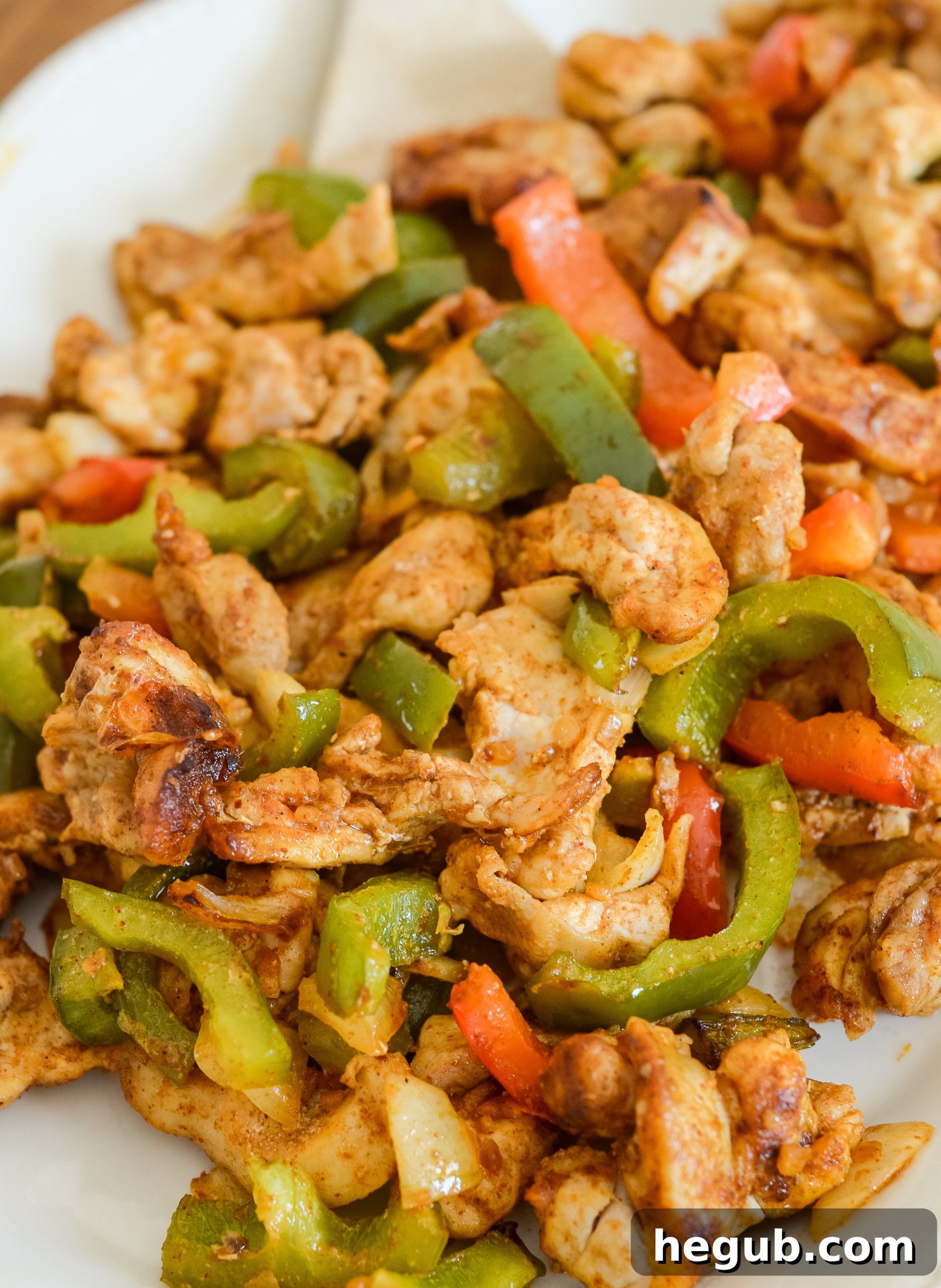 Sizzling Air Fryer Chicken Fajitas with colorful bell peppers and onions, ready to be served