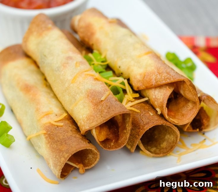 Crispy Air Fryer Beef and Bean Taquitos, a quick and delicious family meal.