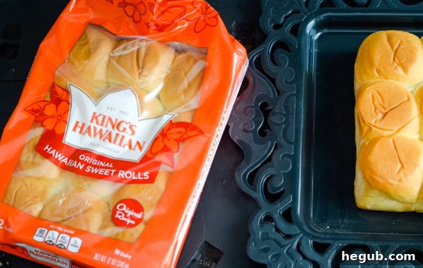 Close-up of Spooky Graveyard Rolls with crushed cookies and candy pumpkins