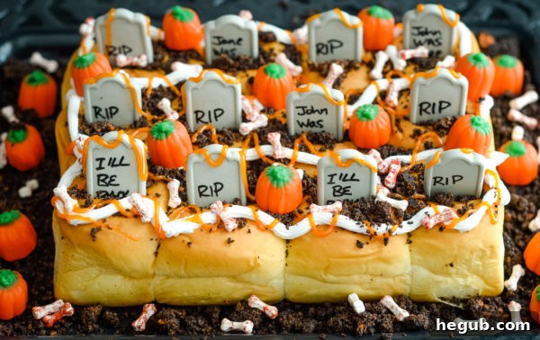 Finished Spooky Graveyard Rolls on a white serving tray