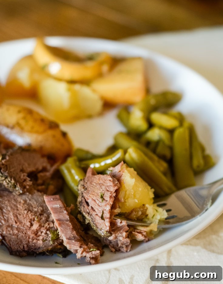 Hearty Slow Cooker Rosemary Roast with tender potatoes