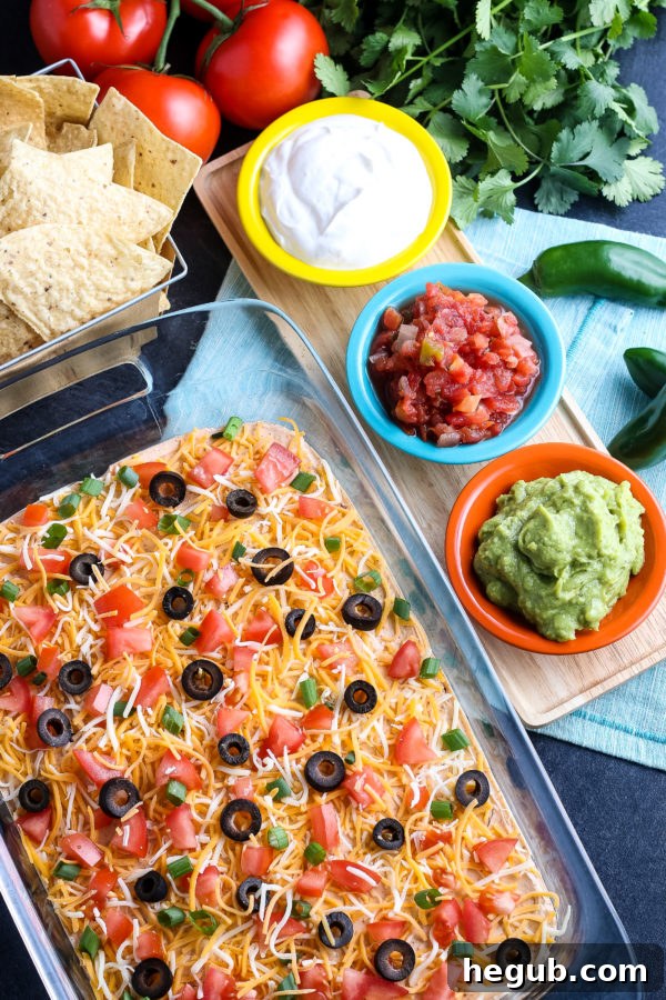 Delicious Layered Taco Dip ready to serve at a party
