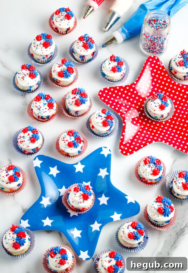 A bowl of red and blue jimmie sprinkles, ready for Gluten-Free Mini Patriotic Cupcakes.