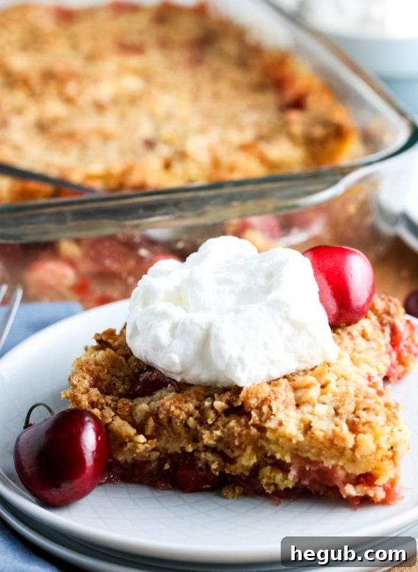 Classic Cherry Dump Cake with golden crust and red cherry filling
