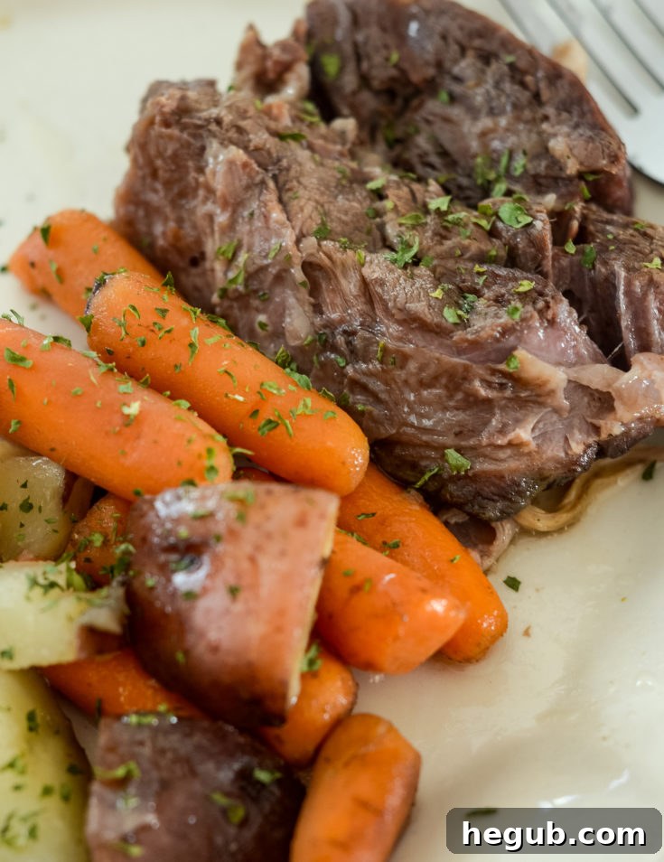 Tender Slow Cooker Maple Roast with vegetables