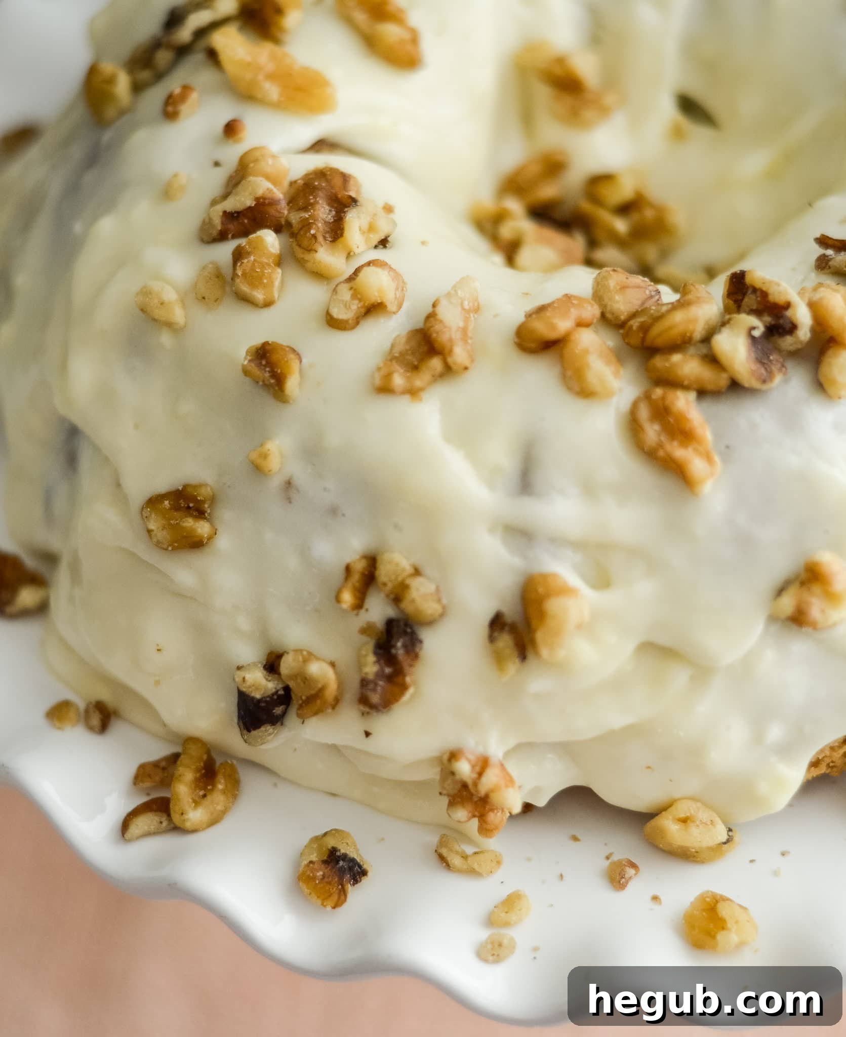 A beautifully frosted Ninja Foodi Carrot Cake, ready for serving.