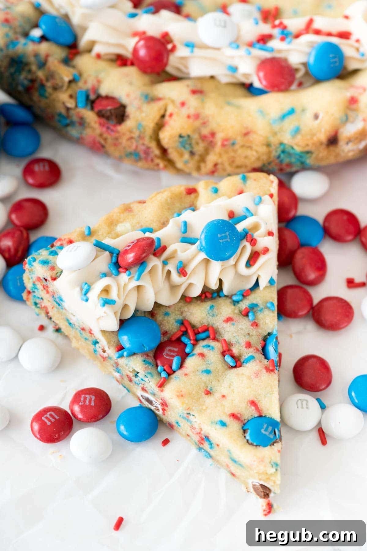 Fireworks Sugar Cookie Cake with patriotic decorations and sprinkles