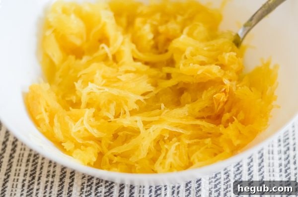 spaghetti squash noodles scraped out with a fork