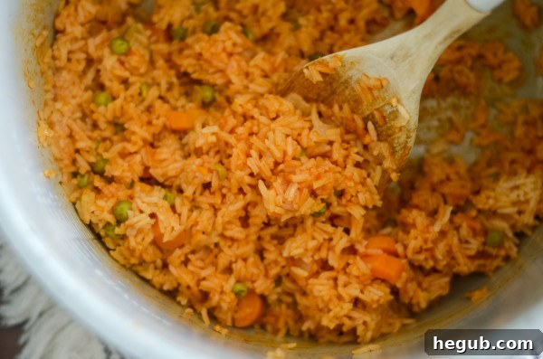 cooked Ninja Foodi Spanish rice in the pot, perfectly fluffy