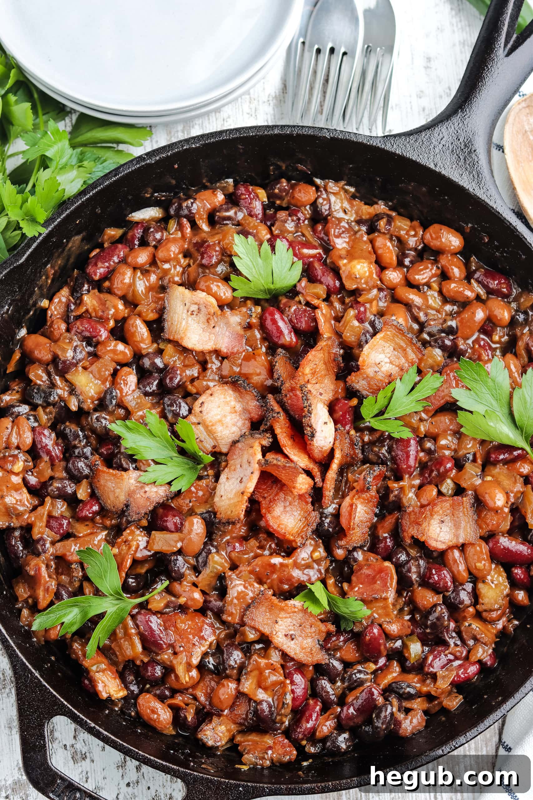 Smoked baked beans cooked right on the pellet grill.